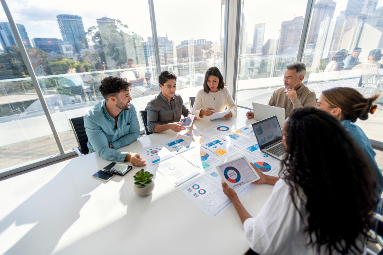 Team meeting in a bright modern office.
