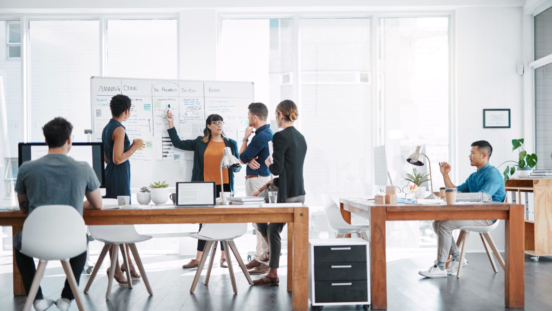 Team collaborating in a modern office space.